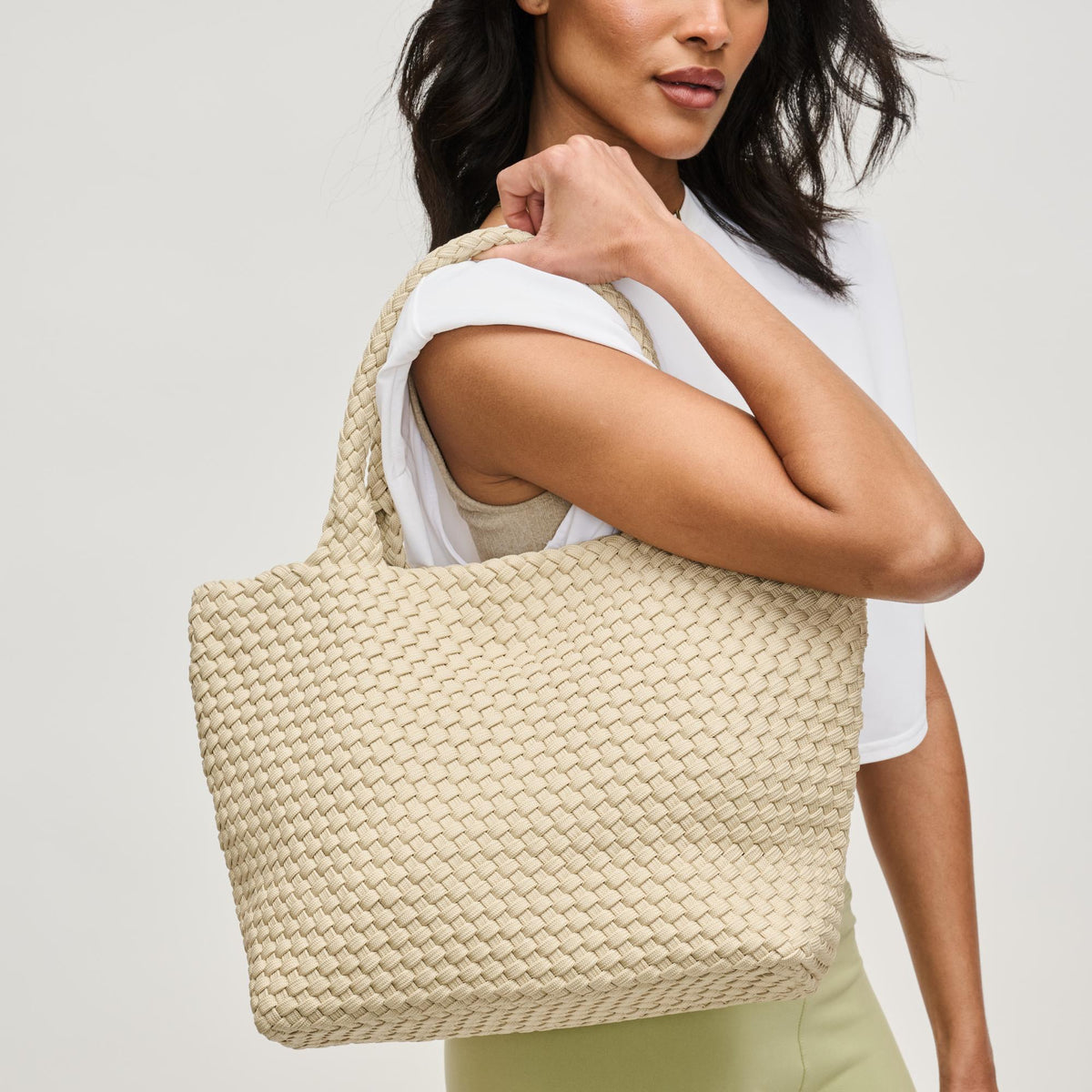 Woman wearing Beige Sol and Selene Sky&#39;s The Limit - Medium Sustainable Tote 841764111584 View 1 | Beige