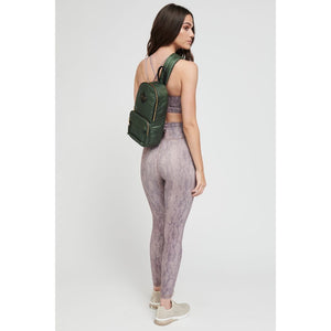 Woman wearing Camo Sol and Selene Hustle Sling Backpack 841764105569 View 3 | Camo