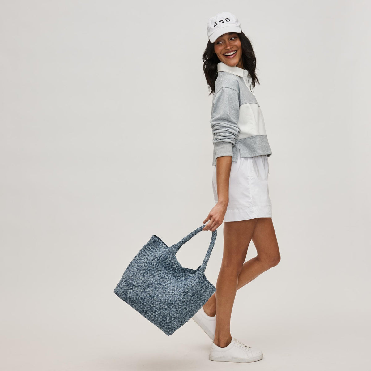 Woman wearing Denim Sol and Selene Sky&#39;s The Limit - Medium Denim Tote 841764111294 View 2 | Denim