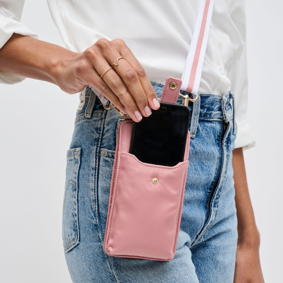 Woman wearing Pastel Pink Sol and Selene Duality Cell Phone Crossbody 840611182289 View 4 | Pastel Pink