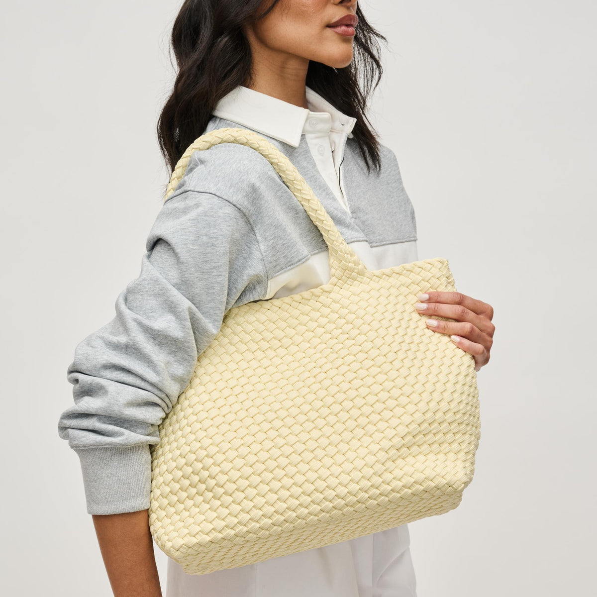 Woman wearing Butter Sol and Selene Sky&#39;s The Limit - Medium Sustainable Tote 841764111607 View 1 | Butter