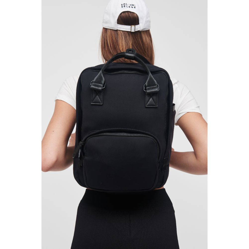 Woman wearing Black Sol and Selene Iconic - Neoprene Backpack 841764106665 View 1 | Black