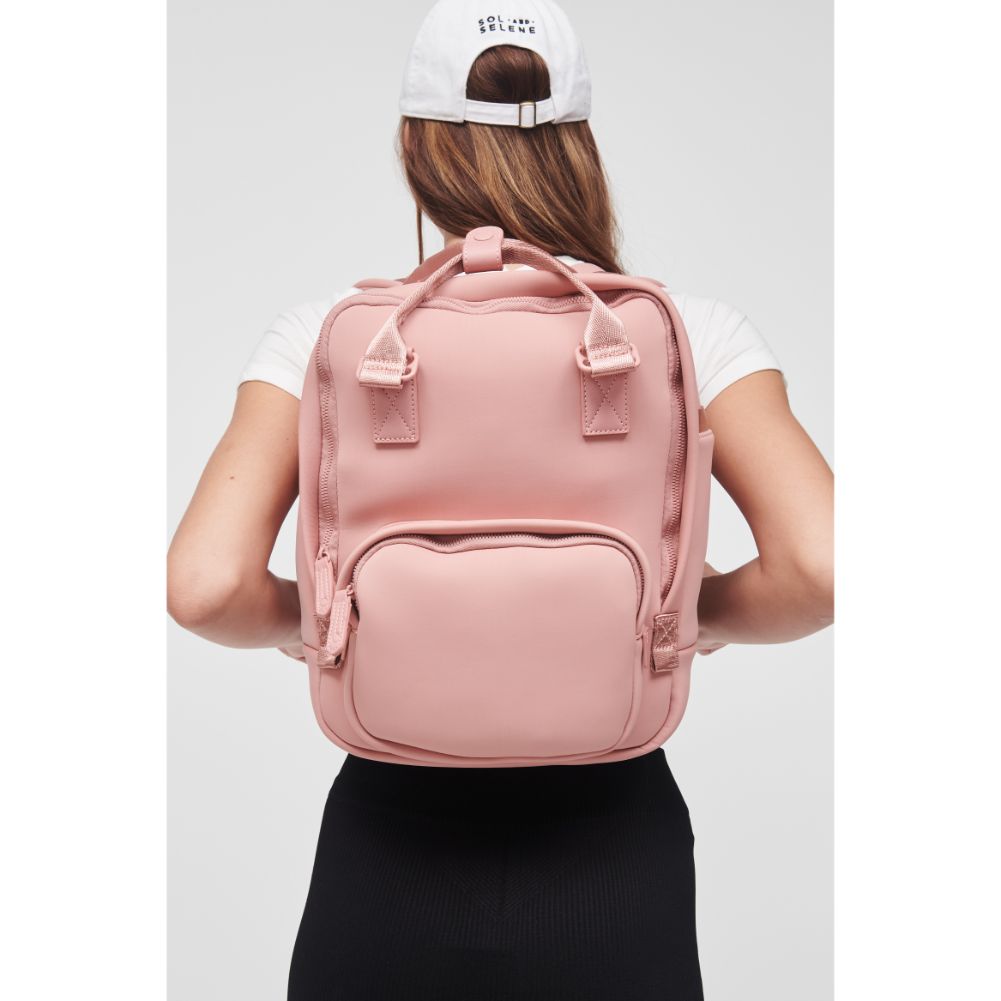 Woman wearing Pastel Pink Sol and Selene Iconic - Neoprene Backpack 841764106696 View 1 | Pastel Pink