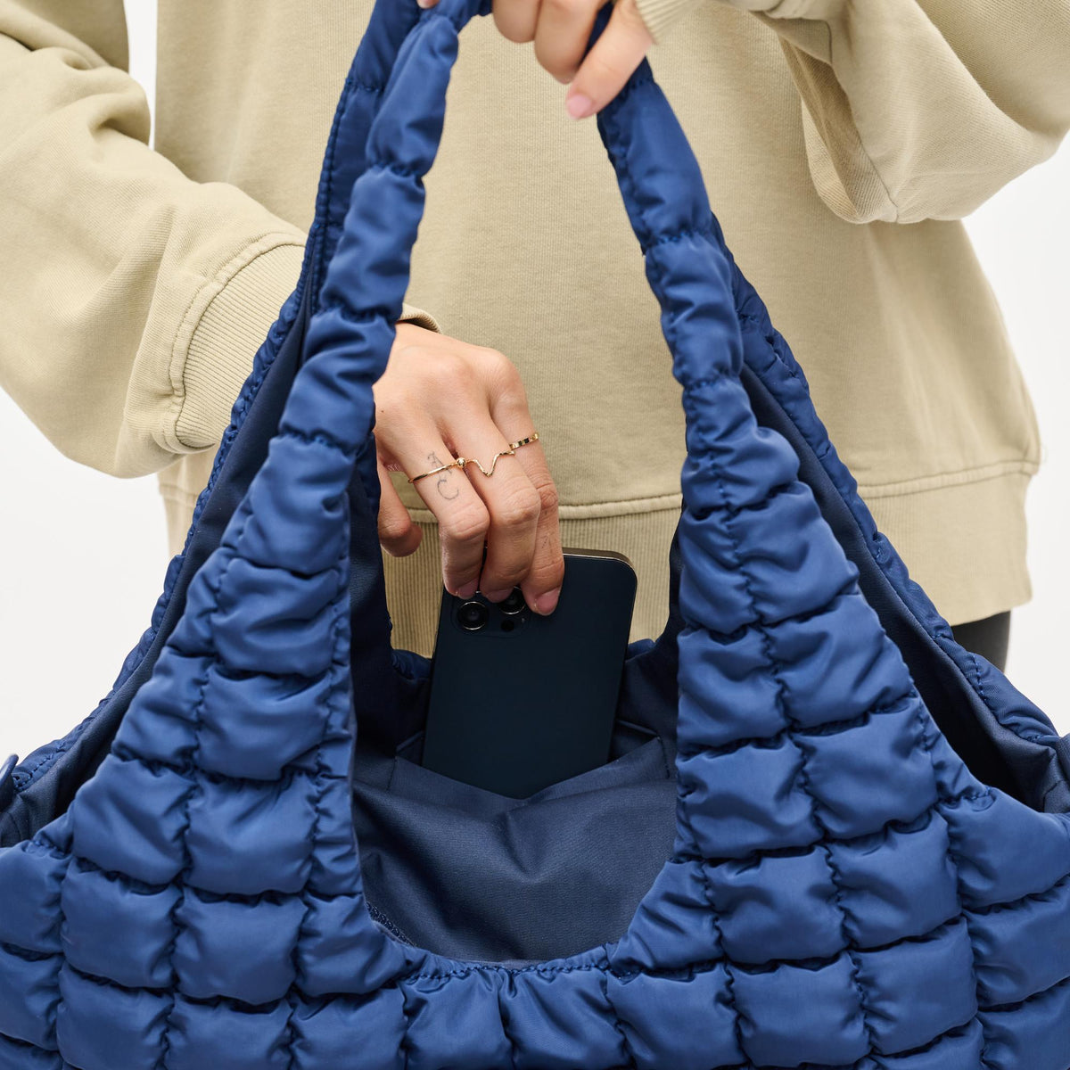 Woman wearing Navy Sol and Selene Elevate Hobo 841764110556 View 4 | Navy