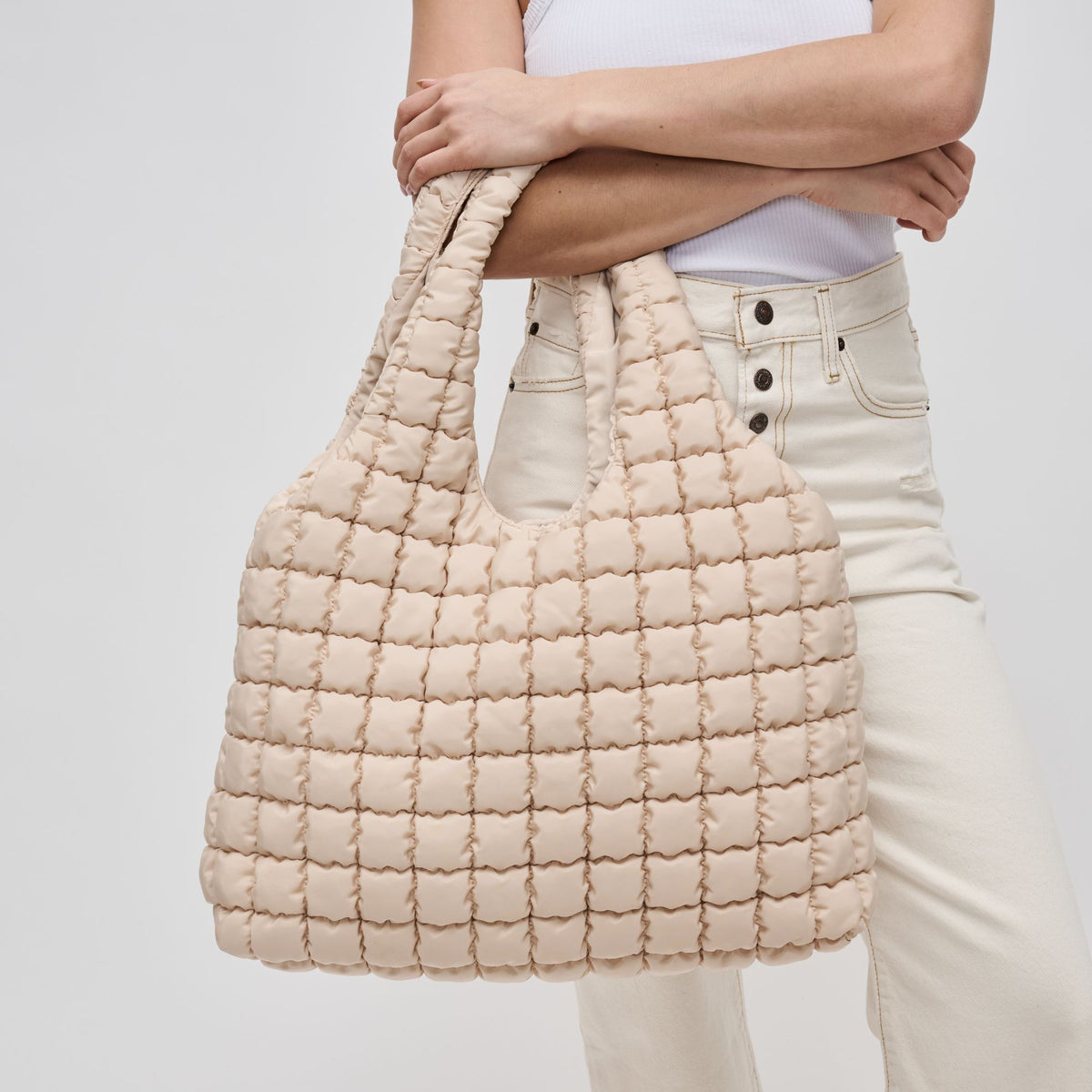 Woman wearing Cream Sol and Selene Elevate Hobo 841764109390 View 2 | Cream