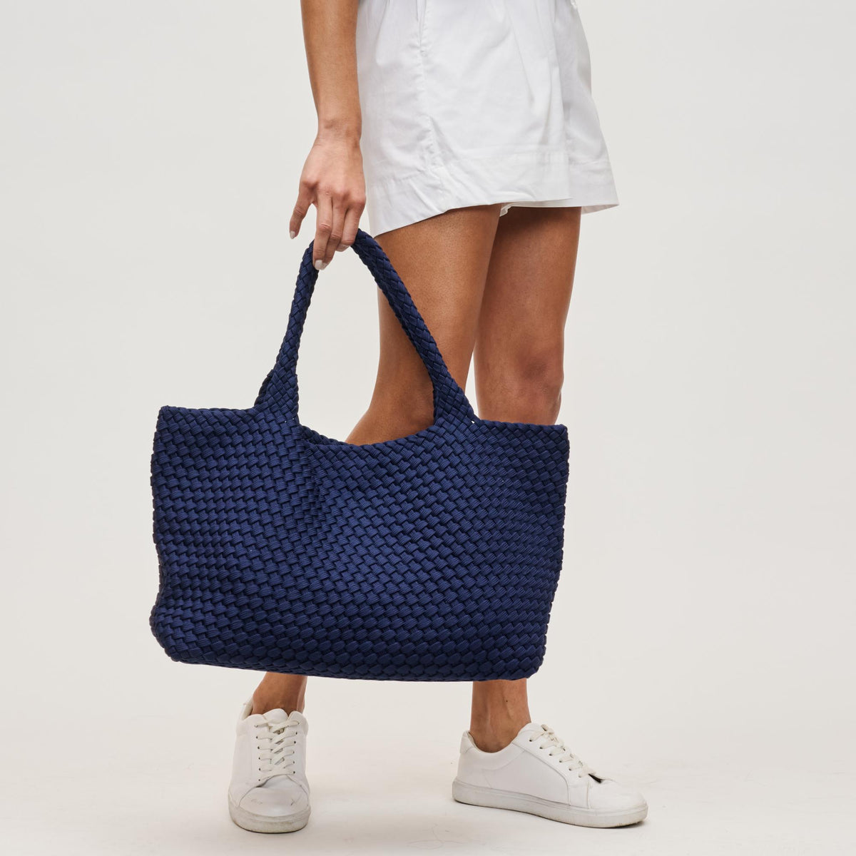 Woman wearing Navy Sol and Selene Sky&#39;s The Limit - Large Sustainable Tote 841764111560 View 2 | Navy