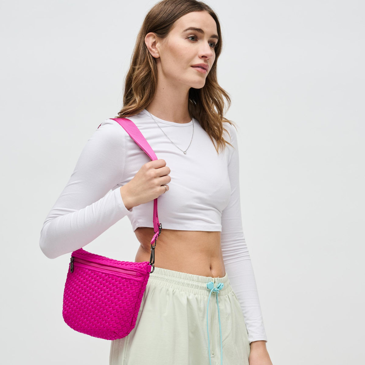 Woman wearing Fuchsia Sol and Selene Ethereal - Woven Neoprene Crossbody 841764110860 View 2 | Fuchsia