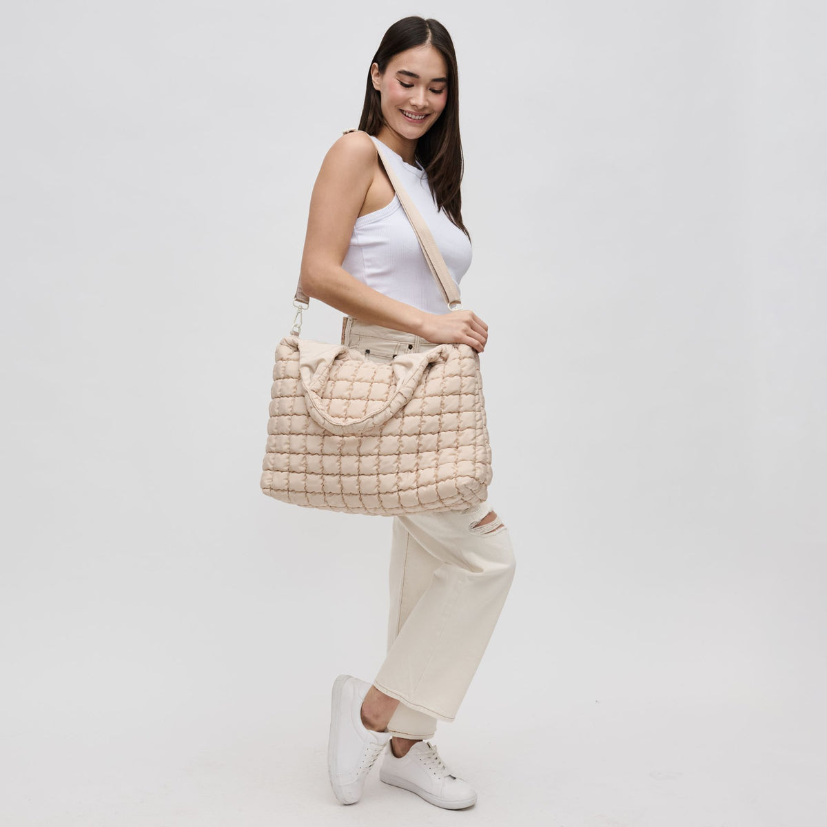 Woman wearing Cream Sol and Selene Elevate Hobo 841764109390 View 3 | Cream