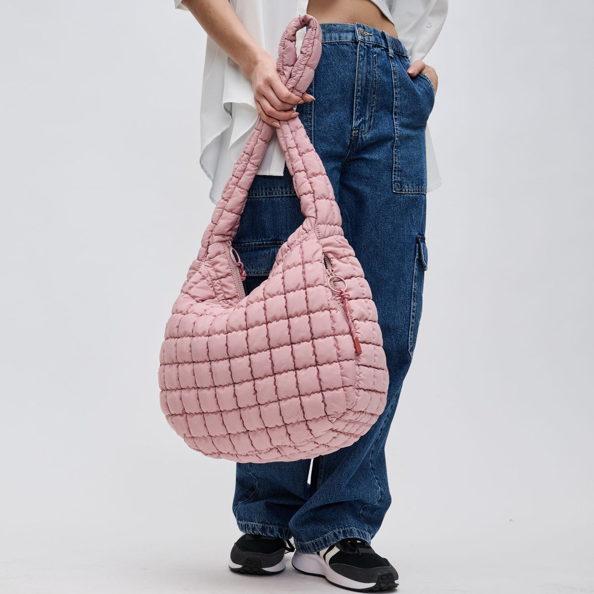 Woman wearing Rose Sol and Selene Revive Hobo 841764109543 View 4 | Rose