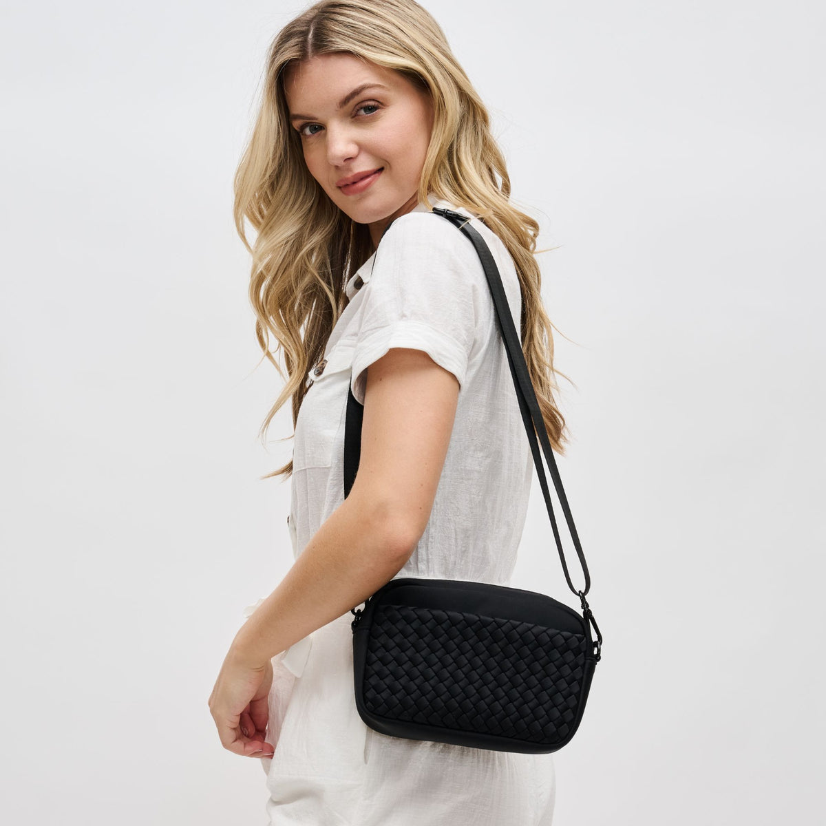 Woman wearing Black Sol and Selene Inspiration - Woven Neoprene Crossbody 841764108317 View 1 | Black