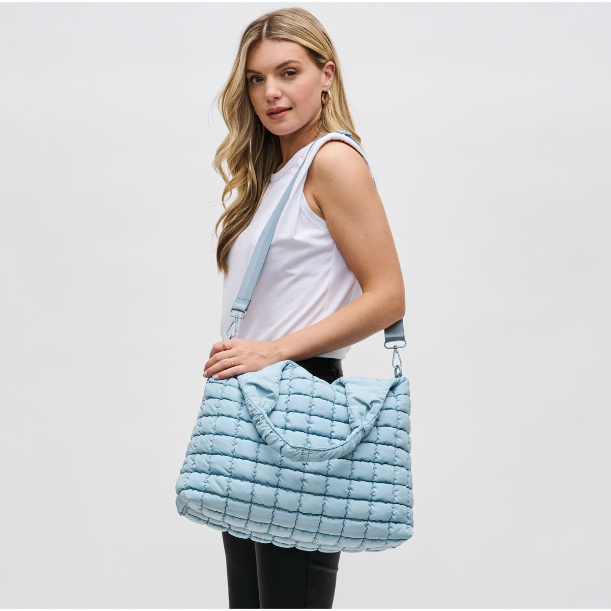 Woman wearing Sky Blue Sol and Selene Elevate Hobo 841764109406 View 3 | Sky Blue