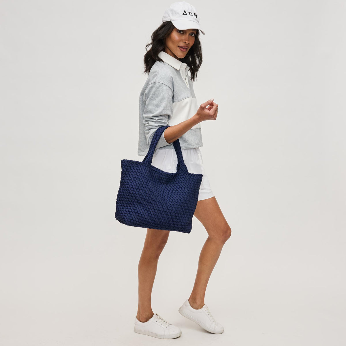 Woman wearing Navy Sol and Selene Sky&#39;s The Limit - Medium Sustainable Tote 841764111614 View 3 | Navy