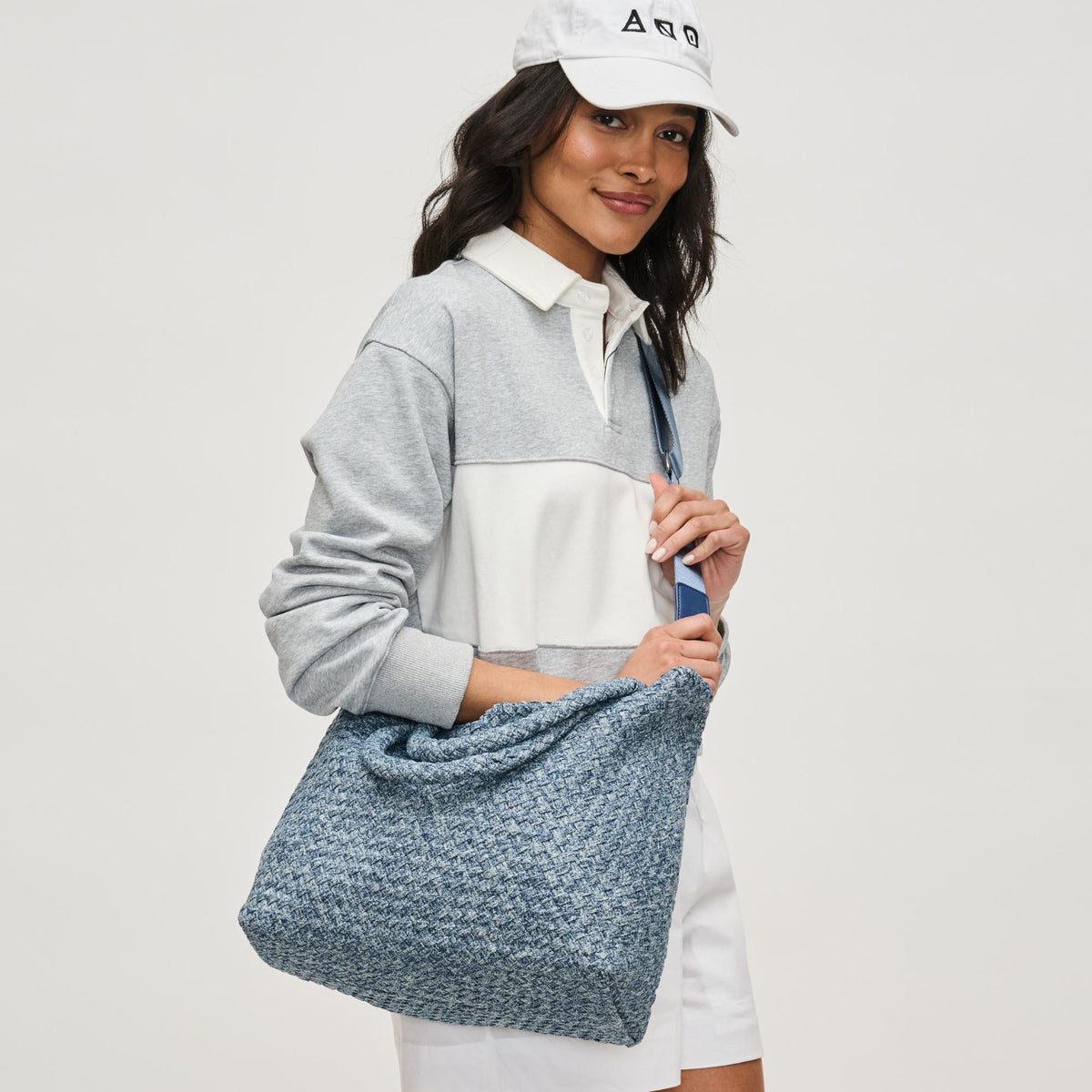 Woman wearing Denim Sol and Selene Sky&#39;s The Limit - Medium Denim Tote 841764111294 View 3 | Denim