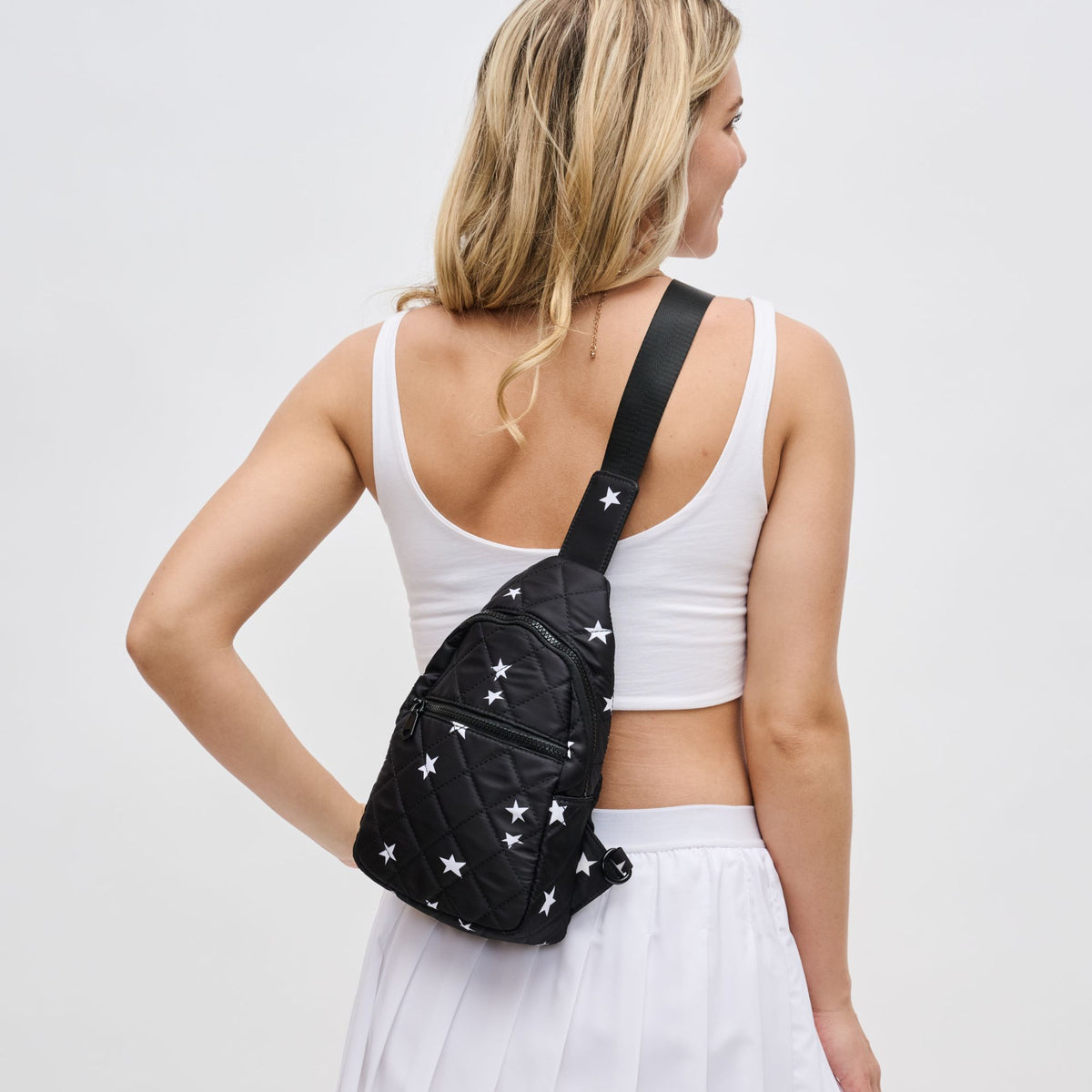 Woman wearing Black Star Sol and Selene Motivator Sling Backpack 841764106887 View 3 | Black Star