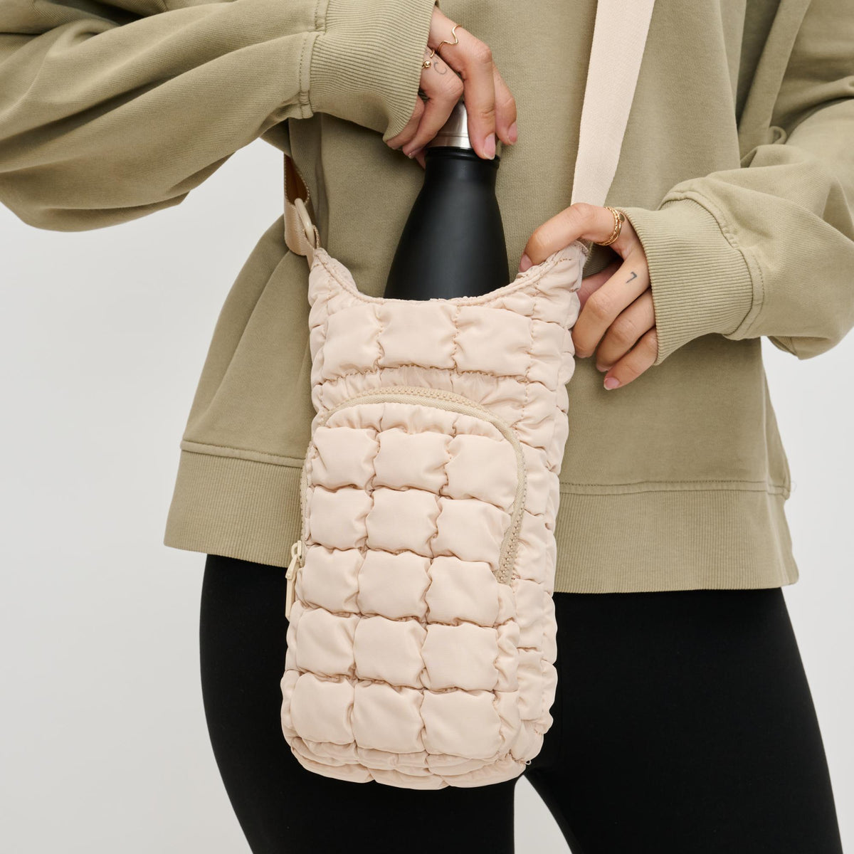 Woman wearing Cream Sol and Selene Let It Flow - Quilted Puffer Crossbody 841764110402 View 4 | Cream