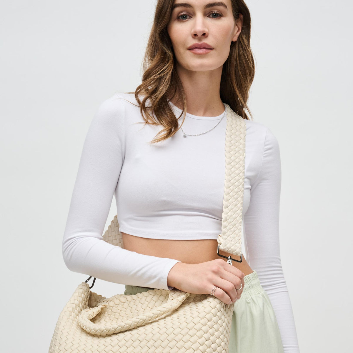 Woman wearing Cream Sol and Selene Prosperous - Woven Neoprene Shoulder Strap 841764111058 View 2 | Cream