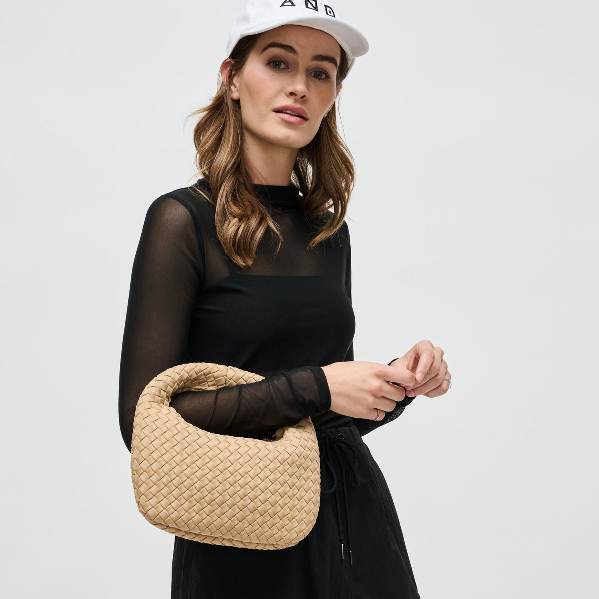 Woman wearing Nude Sol and Selene Dare to Dream - Small Woven Neoprene Clutch 841764111119 View 1 | Nude