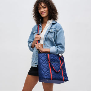 Woman wearing Navy Sol and Selene Motivator Carryall Tote 841764106924 View 2 | Navy