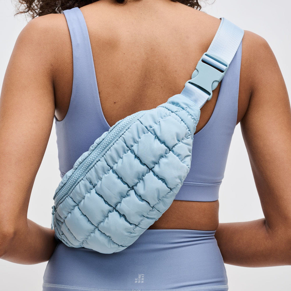 Woman wearing Sky Blue Sol and Selene Resurgence Belt Bag 841764109659 View 4 | Sky Blue