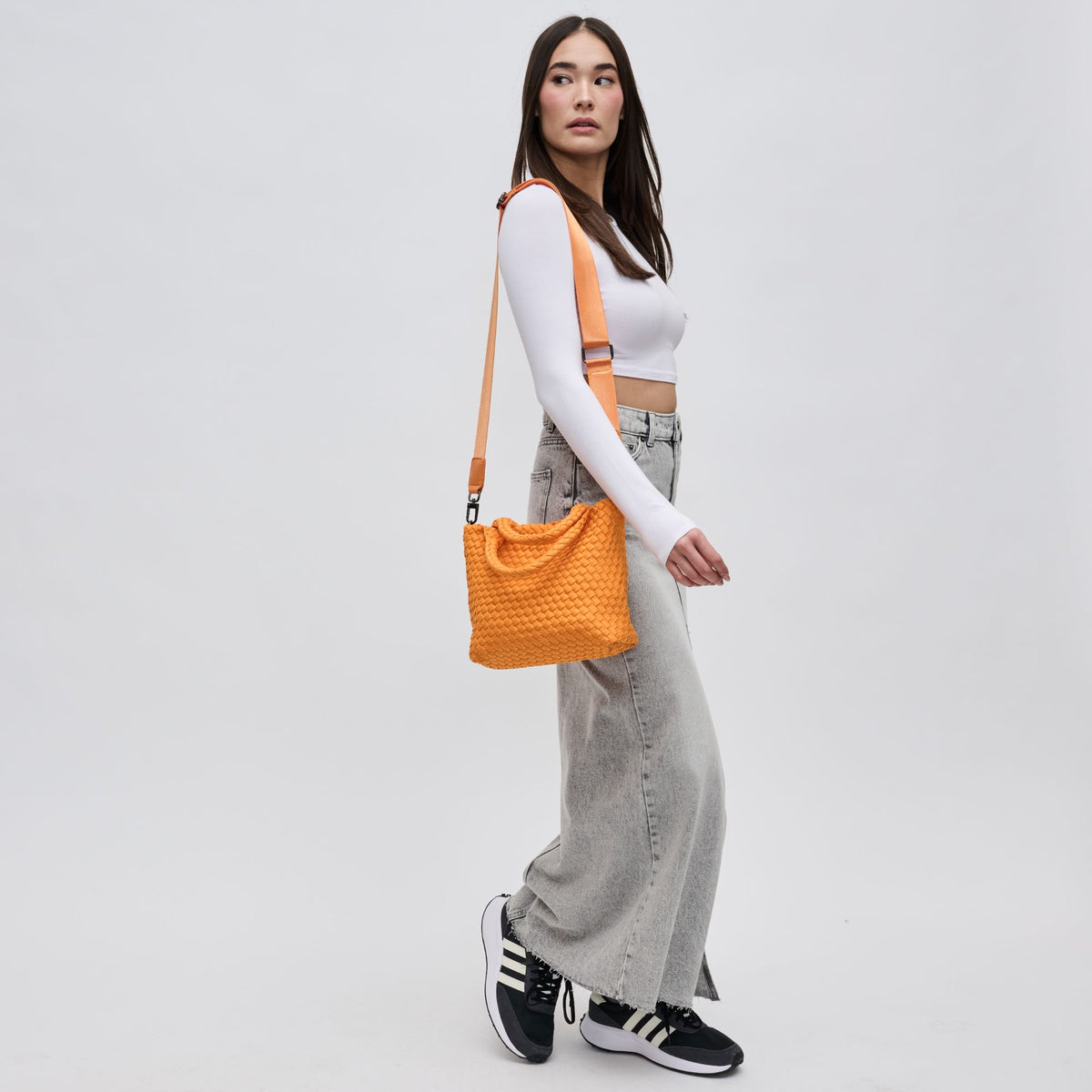 Woman wearing Orange Sol and Selene Sky's The Limit - Small Crossbody 841764109024 View 4 | Orange