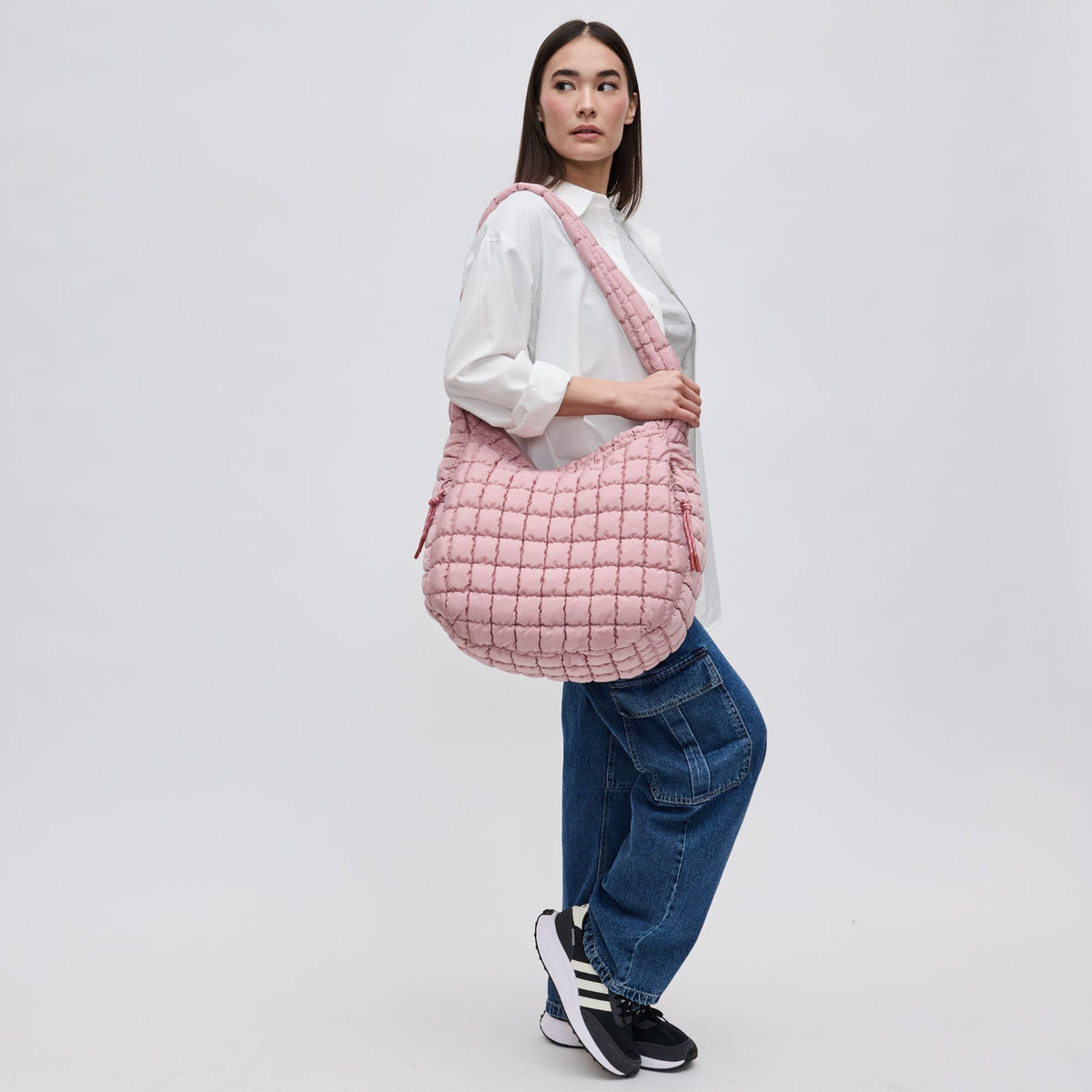 Woman wearing Rose Sol and Selene Revive Hobo 841764109543 View 2 | Rose