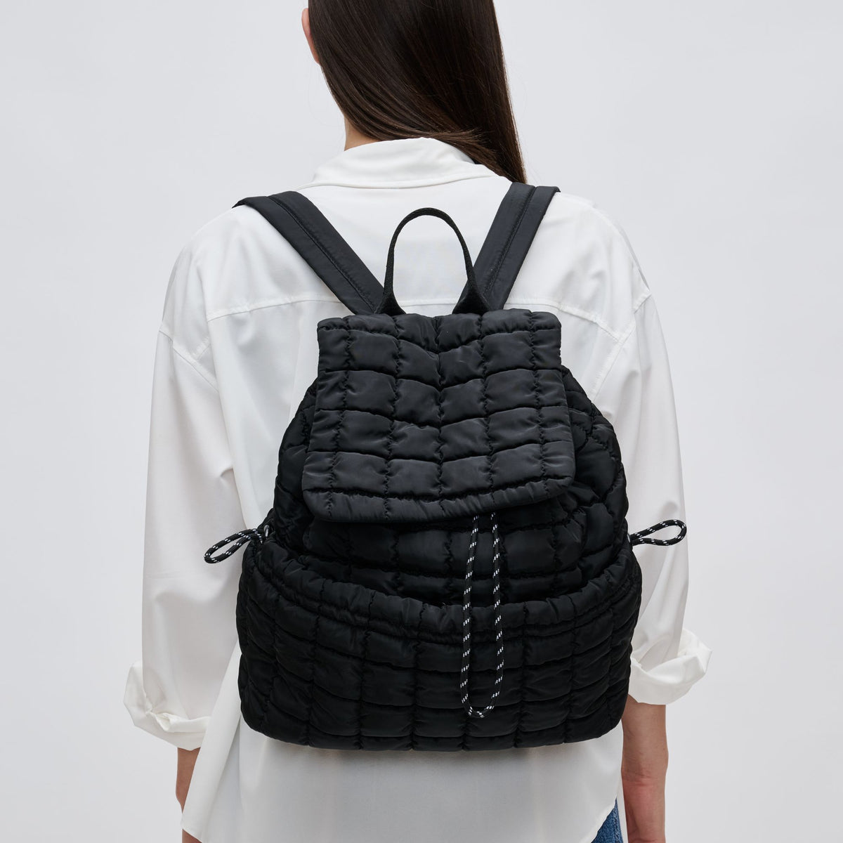 Woman wearing Black Sol and Selene Vitality Backpack 841764108492 View 1 | Black