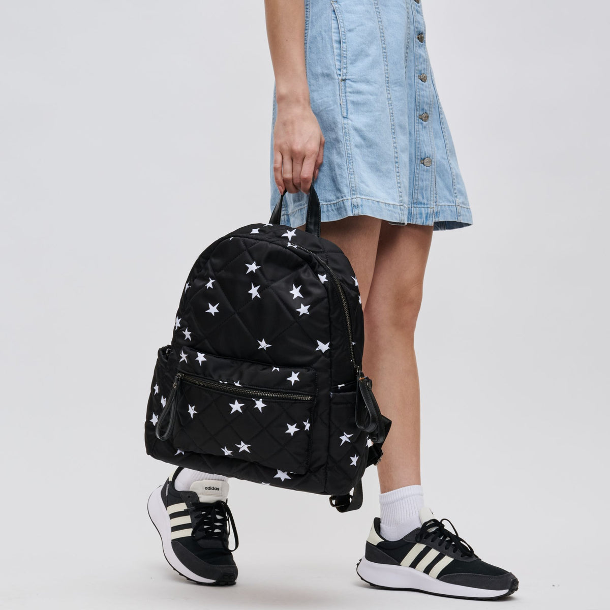 Woman wearing Black Star Sol and Selene Motivator - Medium Backpack 841764103138 View 1 | Black Star