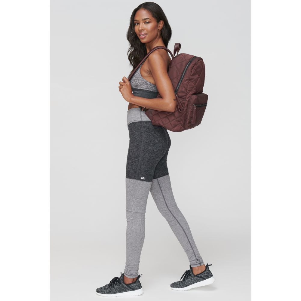 Woman wearing Eggplant Sol and Selene Motivator - Large Travel Backpack 841764101639 View 1 | Eggplant