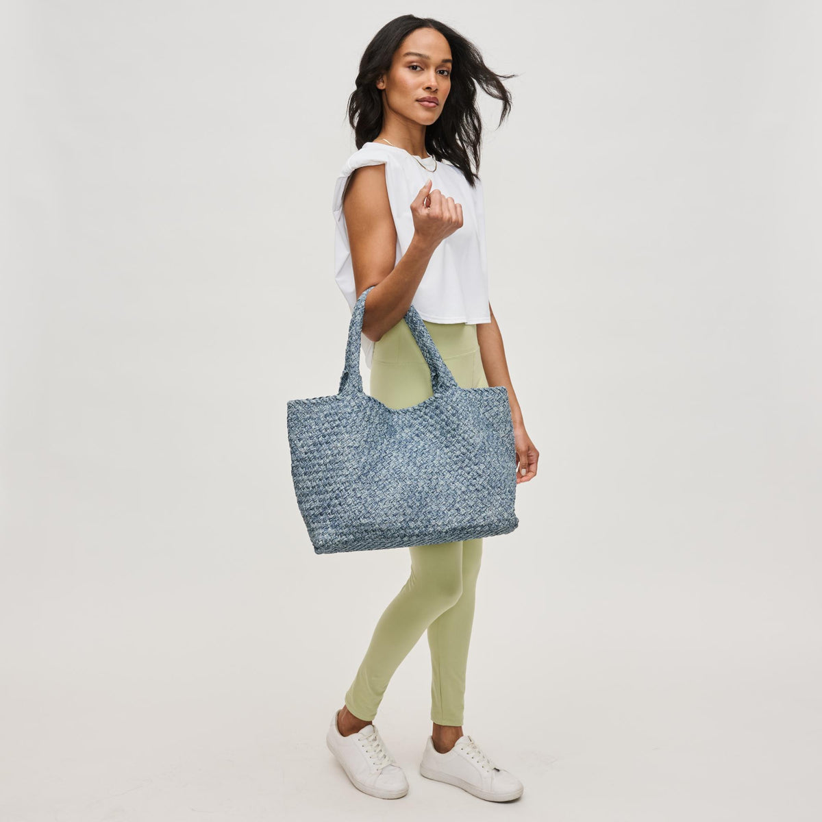 Woman wearing Denim Sol and Selene Sky&#39;s The Limit - Large Denim Tote 841764111348 View 3 | Denim