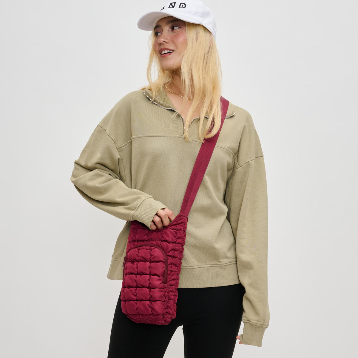 Woman wearing Burgundy Sol and Selene Let It Flow - Quilted Puffer Crossbody 841764110389 View 2 | Burgundy