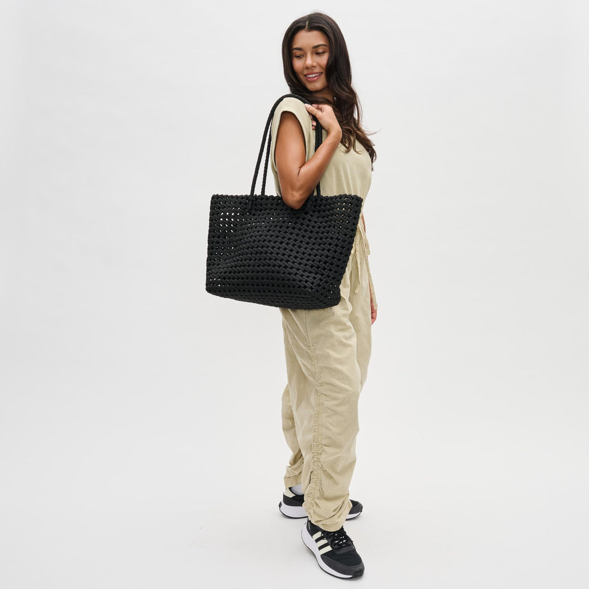 Woman wearing Black Sol and Selene Reflection Tote 841764110082 View 2 | Black