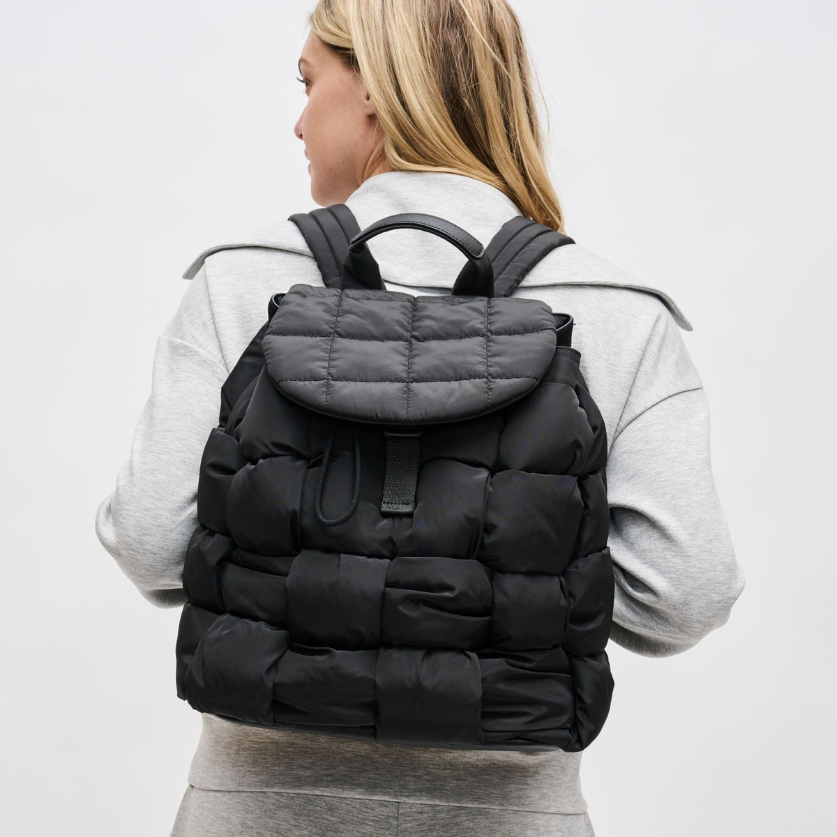 Woman wearing Black Sol and Selene Perception Backpack 841764107730 View 1 | Black