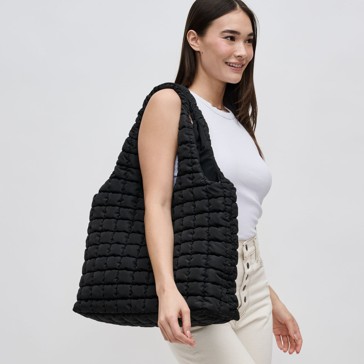 Woman wearing Black Sol and Selene Elevate Hobo 841764109383 View 2 | Black