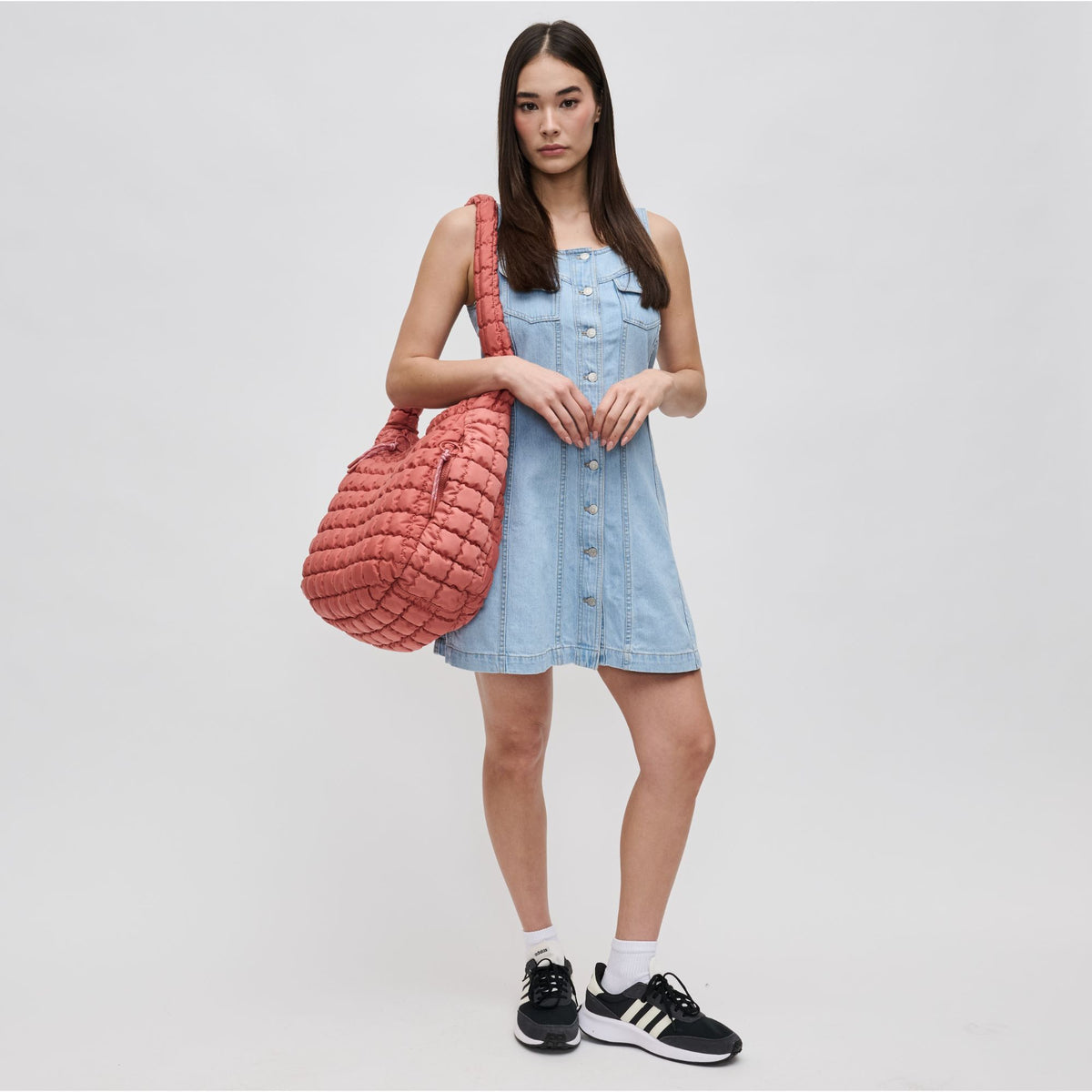 Woman wearing Terracotta Sol and Selene Revive Hobo 841764109550 View 3 | Terracotta