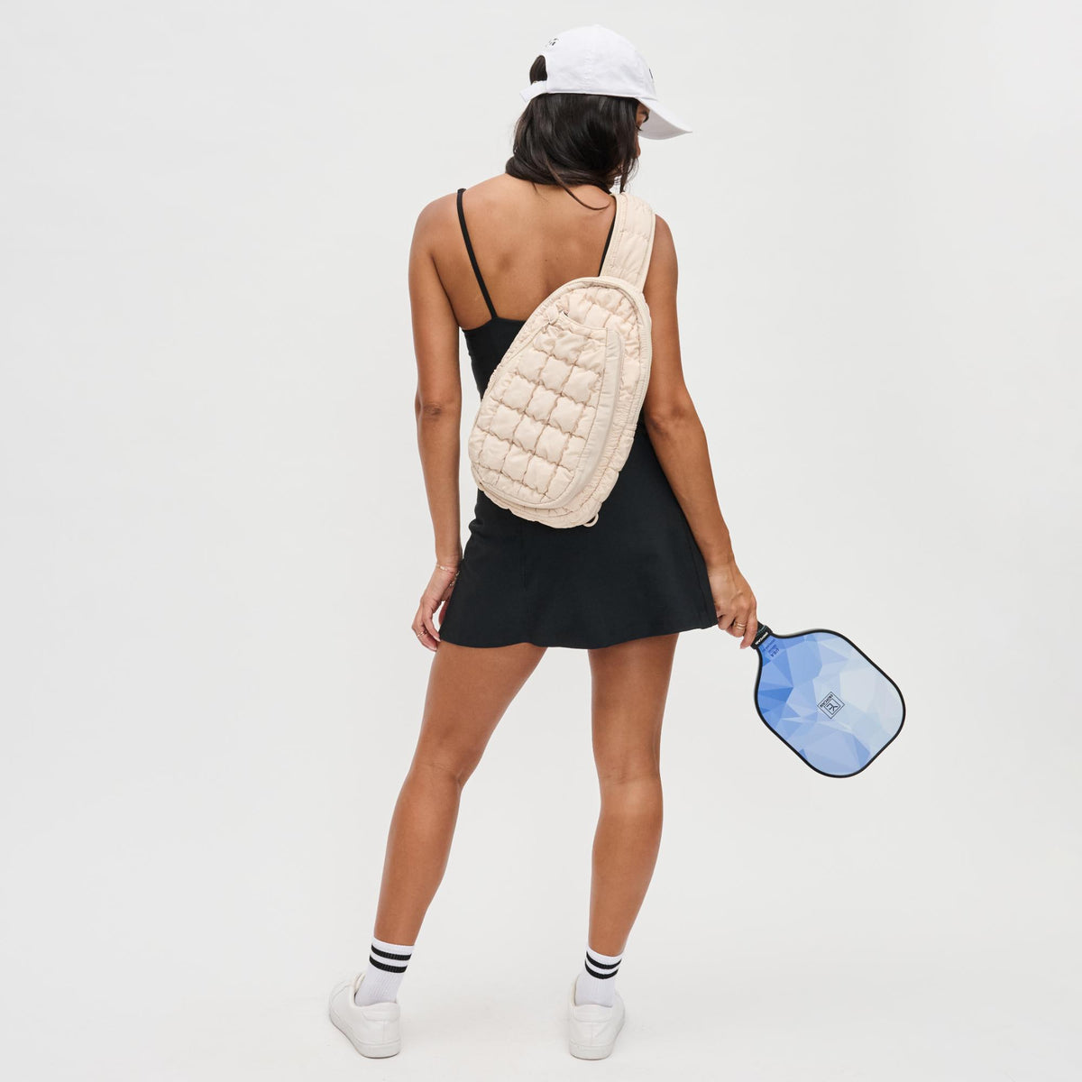 Woman wearing Cream Sol and Selene Match Point - Pickleball Sling Backpack 841764109741 View 3 | Cream