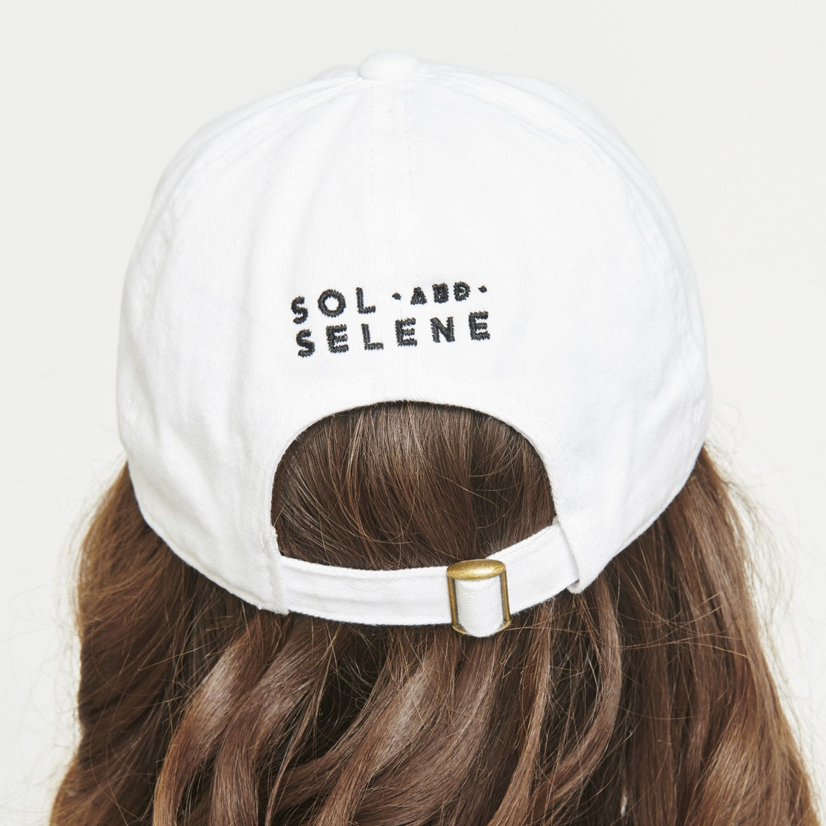 Woman wearing White Sol and Selene AND Logo Hat Baseball Cap 841764106542 View 3 | White