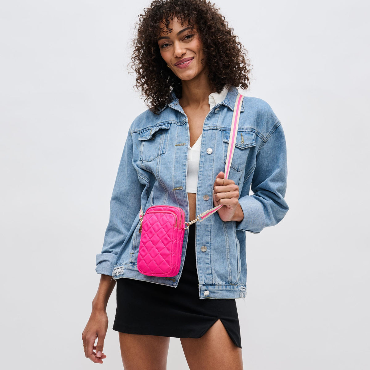 Woman wearing Magenta Sol and Selene Divide &amp; Conquer - Quilted Crossbody 841764108027 View 1 | Magenta