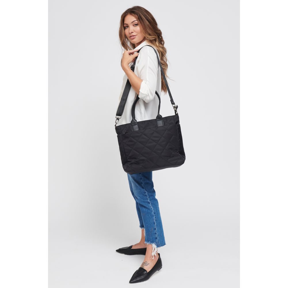 Woman wearing Black Sol and Selene Motivator East West Tote 841764105729 View 3 | Black