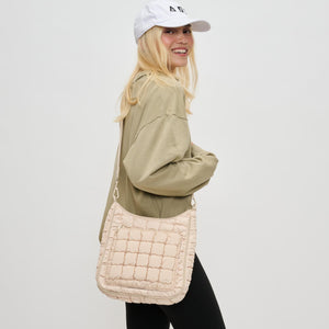 Woman wearing Cream Sol and Selene Aura Crossbody 841764110754 View 1 | Cream