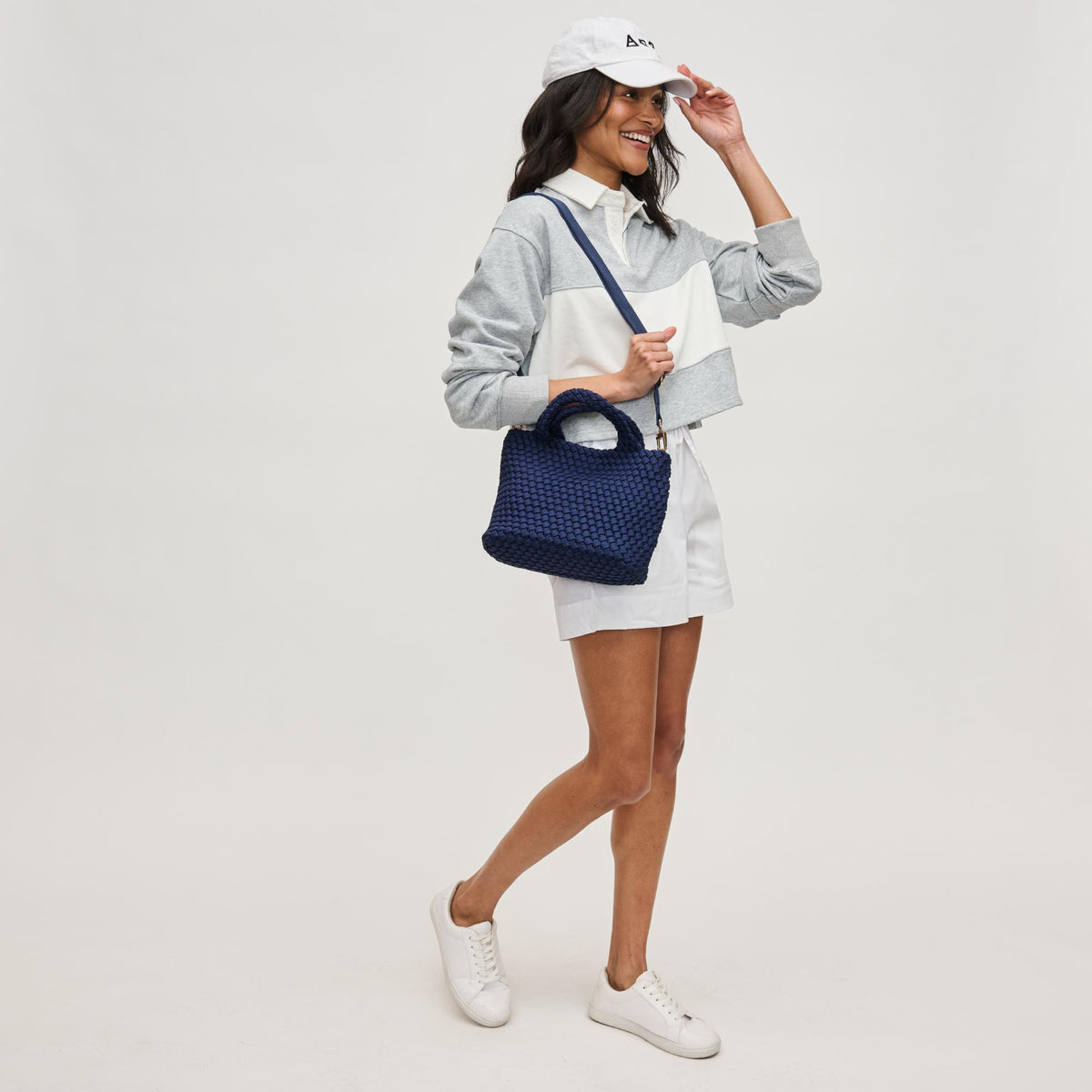 Woman wearing Navy Sol and Selene Sky&#39;s The Limit - Small Sustainable Crossbody 841764111720 View 3 | Navy