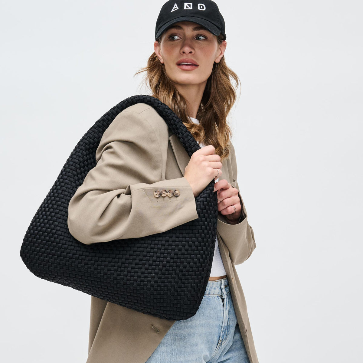 Woman wearing Black Sol and Selene Dare to Dream - Large Woven Neoprene Hobo 841764110914 View 2 | Black