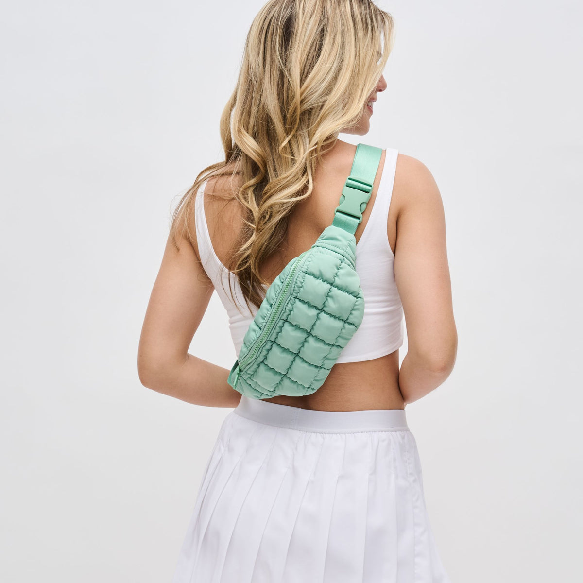 Woman wearing Pistachio Sol and Selene Resurgence Belt Bag 841764109703 View 3 | Pistachio