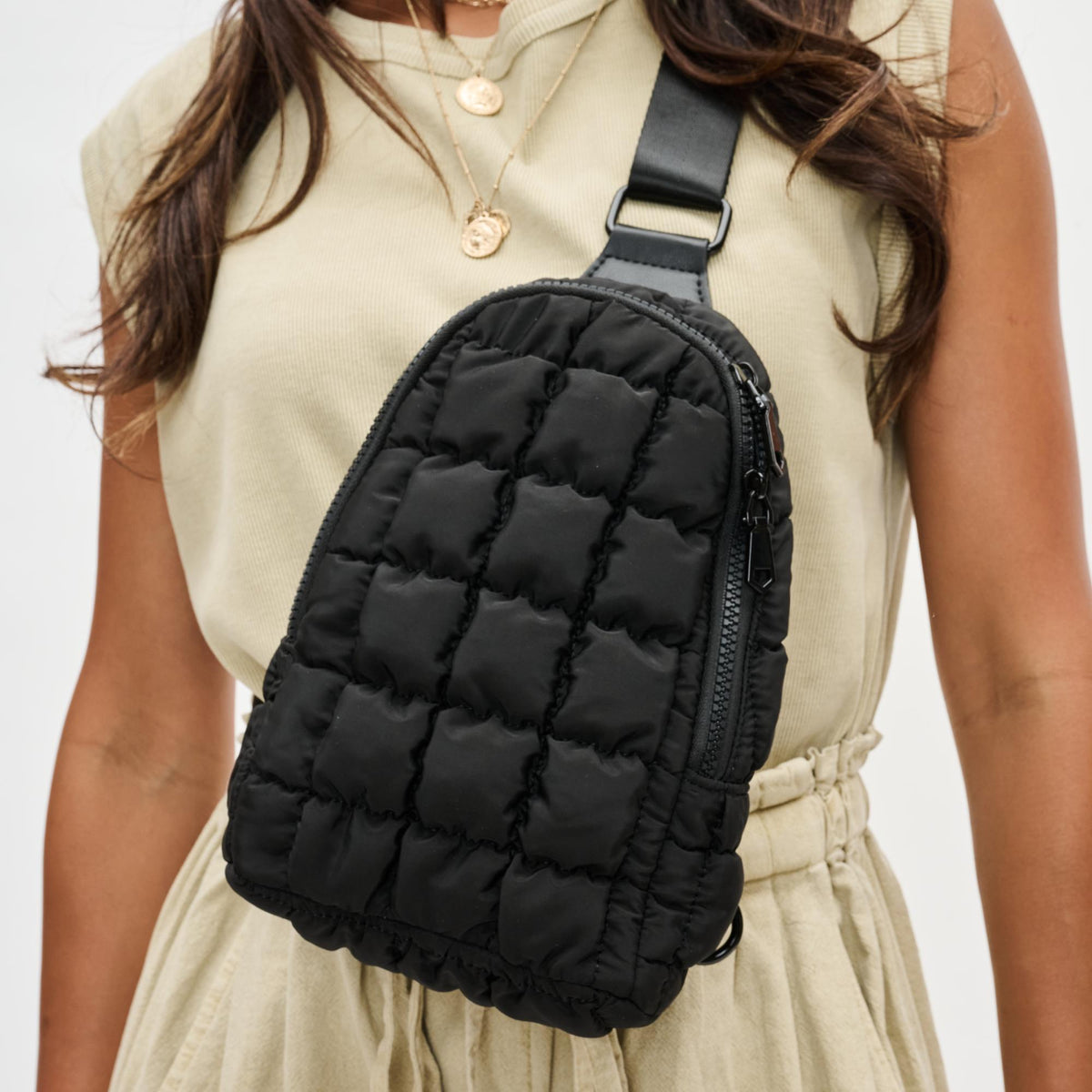 Woman wearing Black Sol and Selene Rejuvenate Sling Backpack 841764108621 View 1 | Black