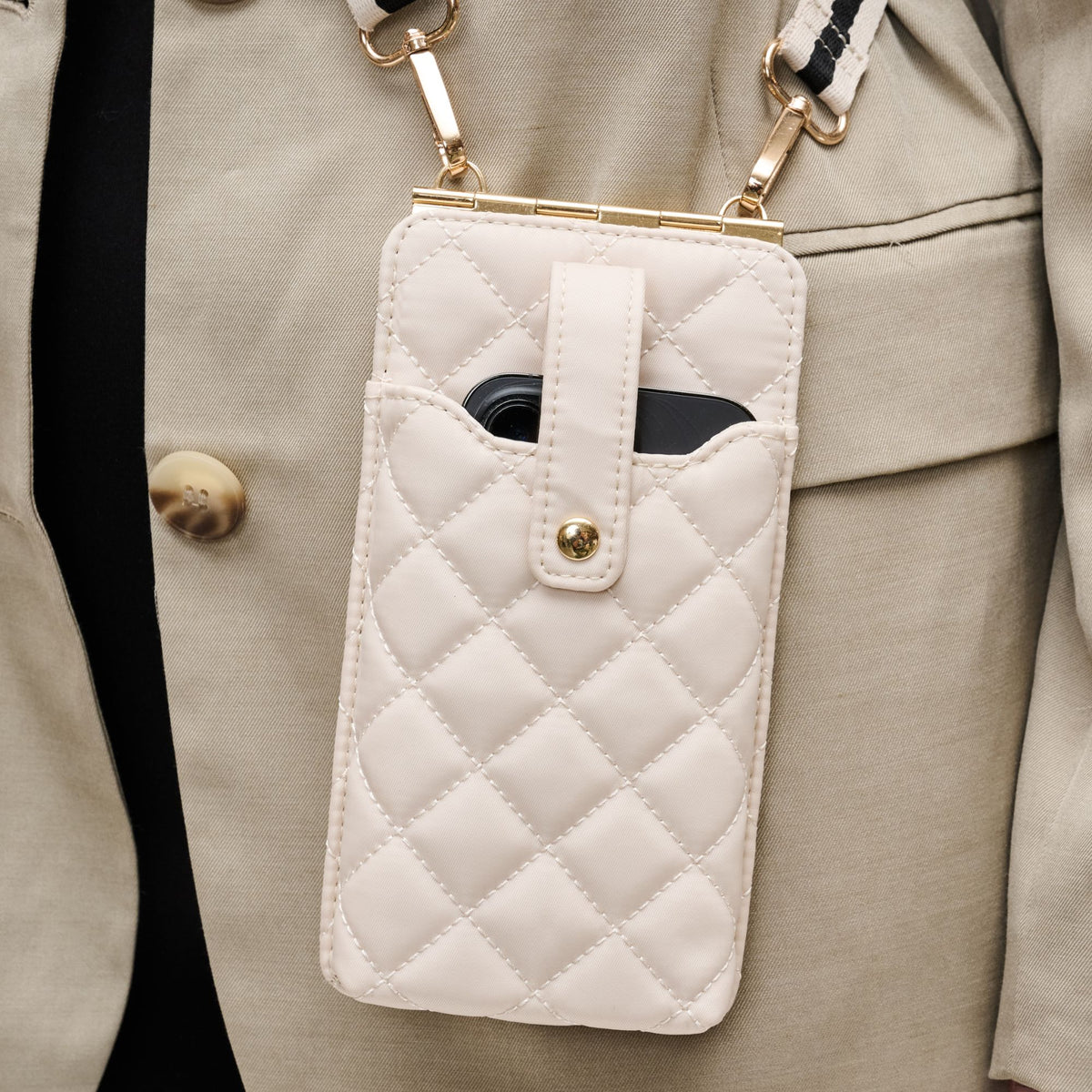 Woman wearing Cream Sol and Selene Duality - Quilted Cell Phone Crossbody 841764109352 View 4 | Cream