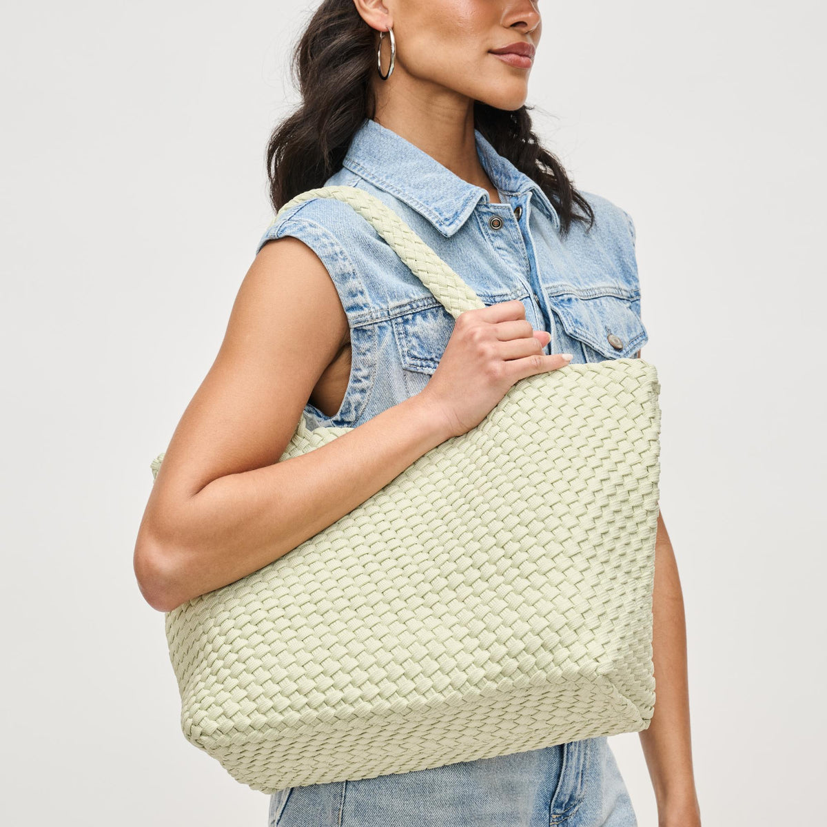 Woman wearing Pistachio Sol and Selene Sky&#39;s The Limit - Medium Sustainable Tote 841764111638 View 1 | Pistachio