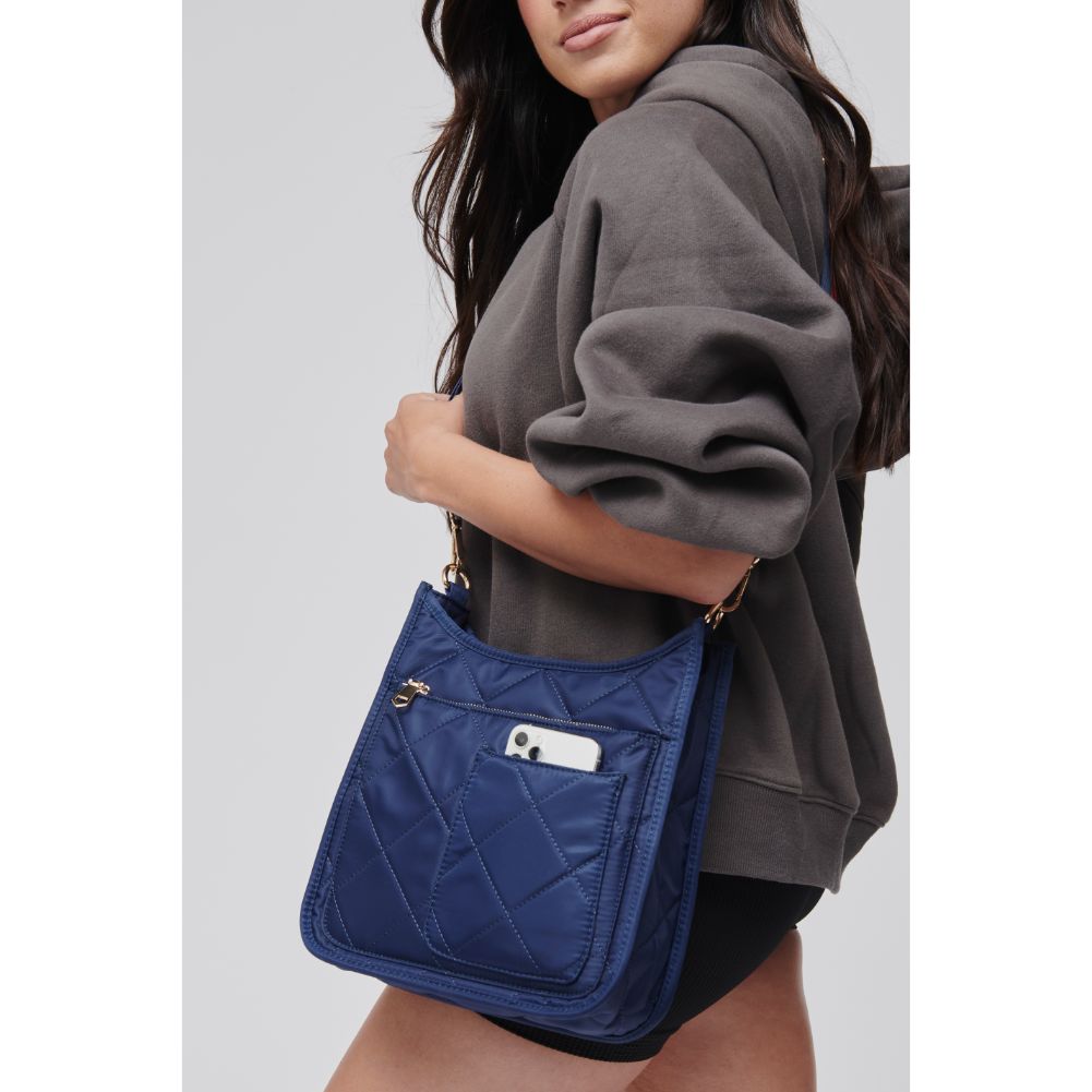 Woman wearing Navy Sol and Selene Motivator Messenger Crossbody 841764106788 View 1 | Navy