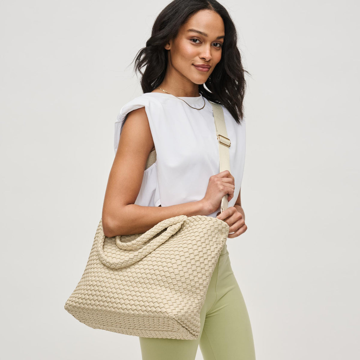 Woman wearing Beige Sol and Selene Sky&#39;s The Limit - Medium Sustainable Tote 841764111584 View 3 | Beige