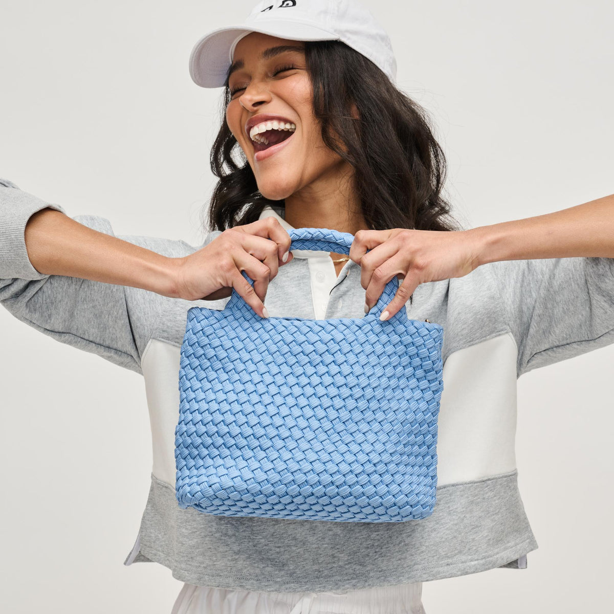 Woman wearing Azure Sol and Selene Sky&#39;s The Limit - Small Sustainable Crossbody 841764111676 View 2 | Azure