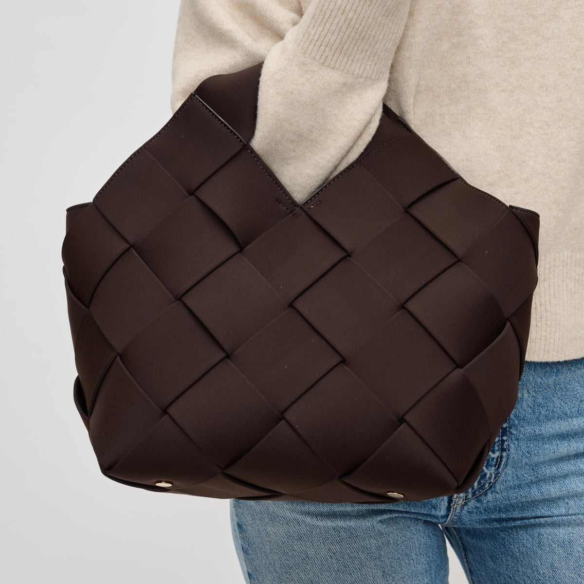 Woman wearing Chocolate Sol and Selene Resilience - Woven Neoprene Tote 841764110129 View 4 | Chocolate