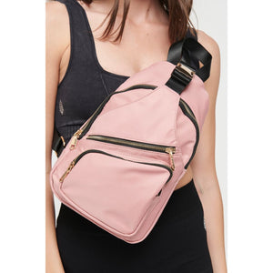 Woman wearing Pastel Pink Sol and Selene On The Go - Nylon Sling Backpack 841764106276 View 3 | Pastel Pink